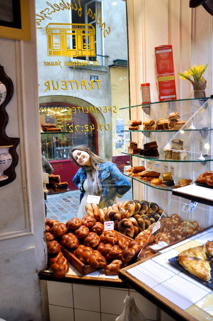 Margaux looking through a Jewish bakery